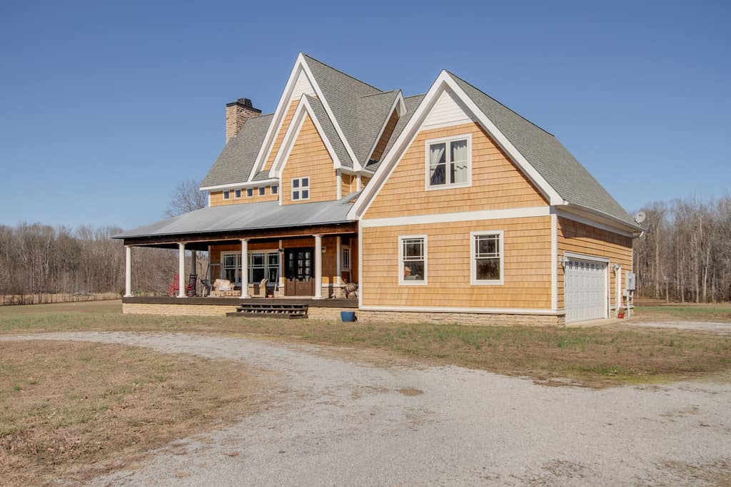 For sale: New England style home with hangar and 6.18 acres on private airpark
